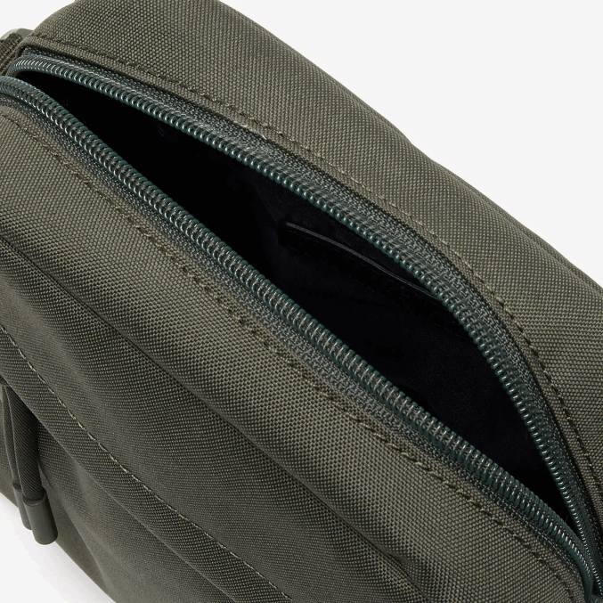 58 VVL0A2120 hombres Lacoste bolso multiusos vertical de lona neocroc