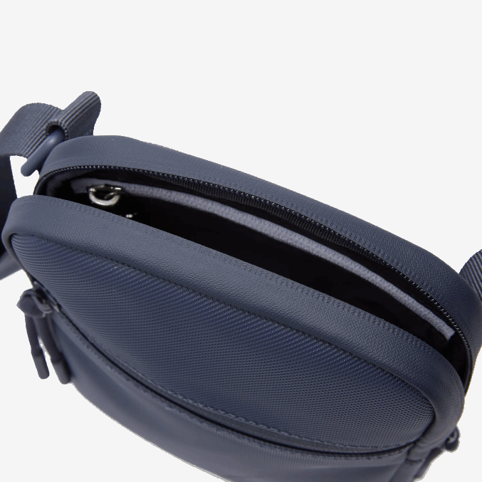 eclipsar b88 VVL0A2016 hombres Lacoste bolsa crossbody plana pequeña de lona revestida lcst