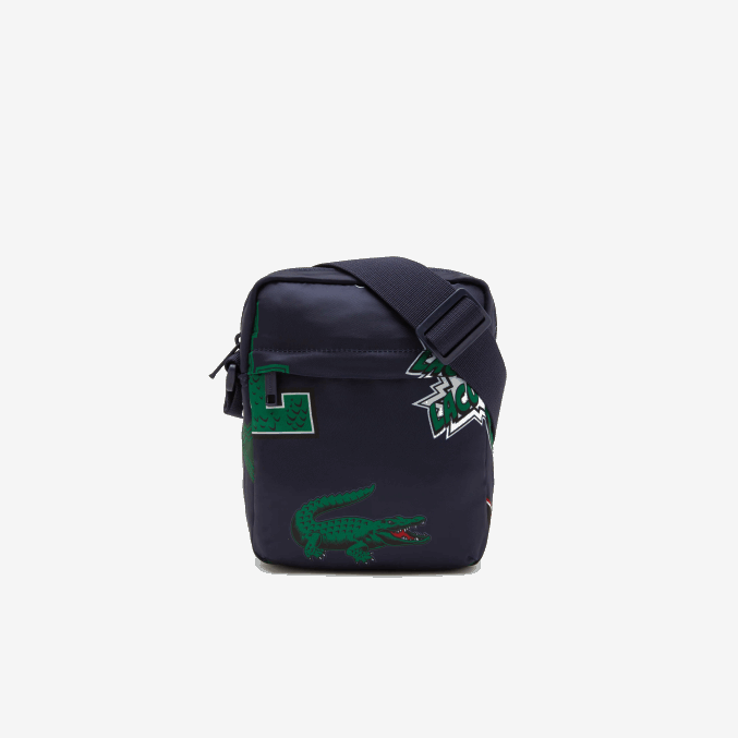 marino 166 cocodrilo por toda la prenda l25 VVL0A2092 hombres Lacoste bolsa cámara vertical con estampado de cómic
