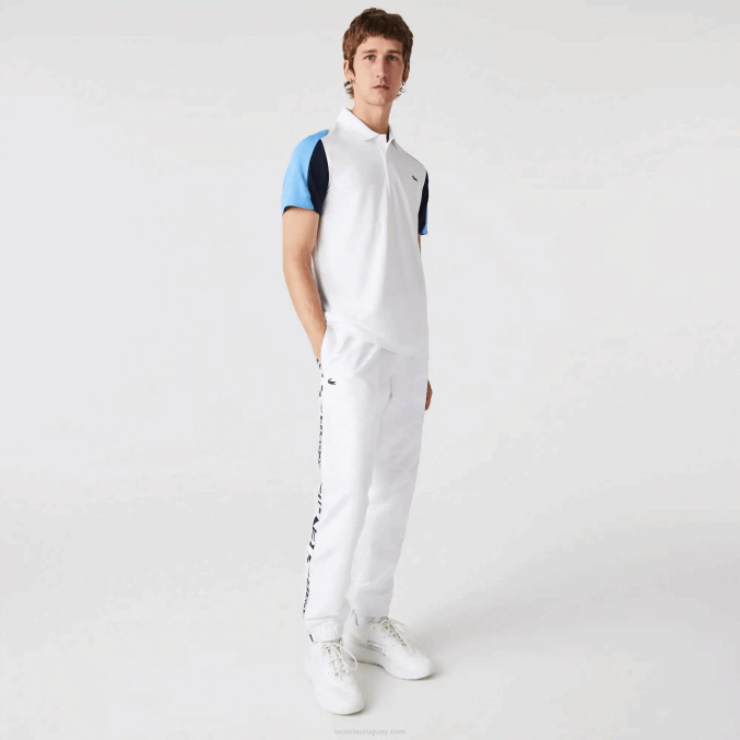 blanco azul marino 5yp VVL0A556 hombres Lacoste Polo deportivo de tenis de piqué resistente a las carreras de ajuste regular