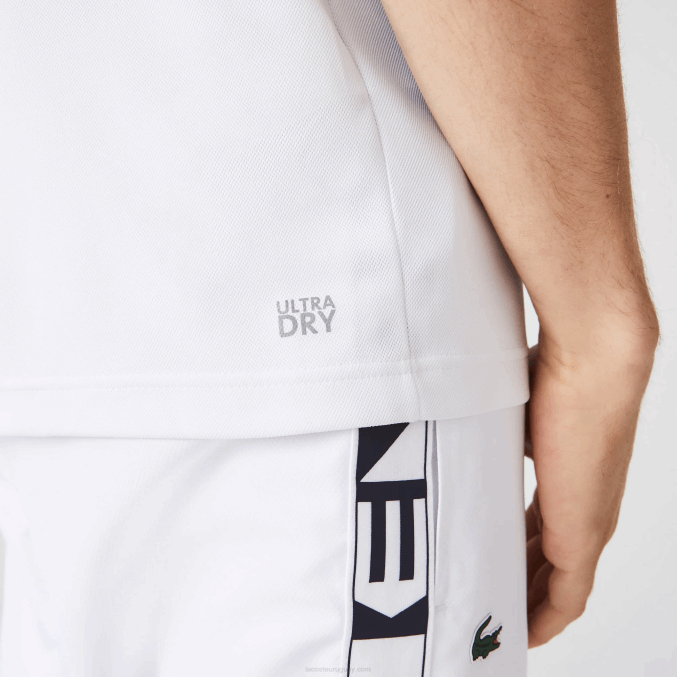 blanco azul marino 5yp VVL0A556 hombres Lacoste Polo deportivo de tenis de piqué resistente a las carreras de ajuste regular