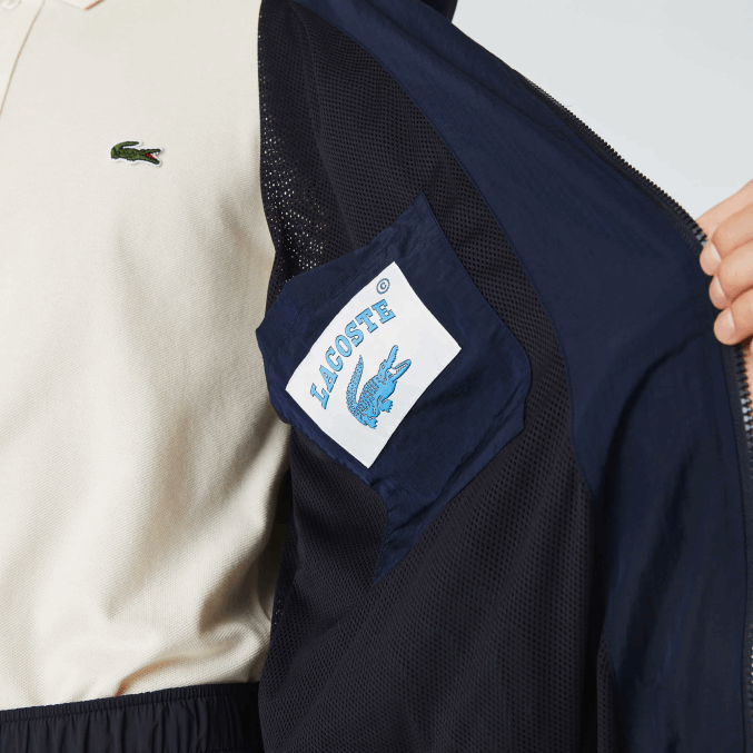 azul marino 5fs VVL0A1315 hombres Lacoste chamarra con cremallera y bloques de colores con logo gráfico en vivo