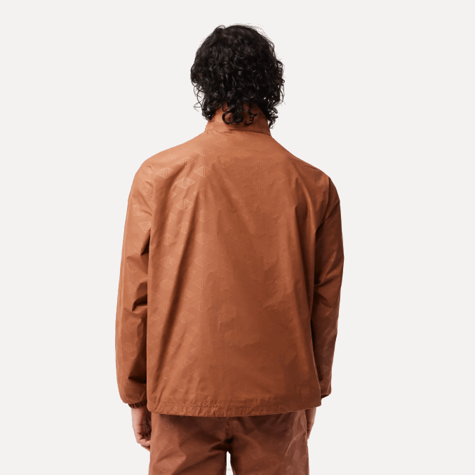 lfa marrón claro VVL0A378 hombres Lacoste chamarra deportiva con monograma estampado