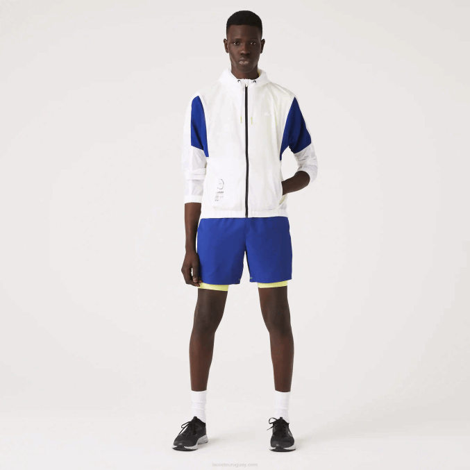 llamativa pelea negra amarilla VVL0A1307 hombres Lacoste chamarra deportiva plegable de nailon con cremallera