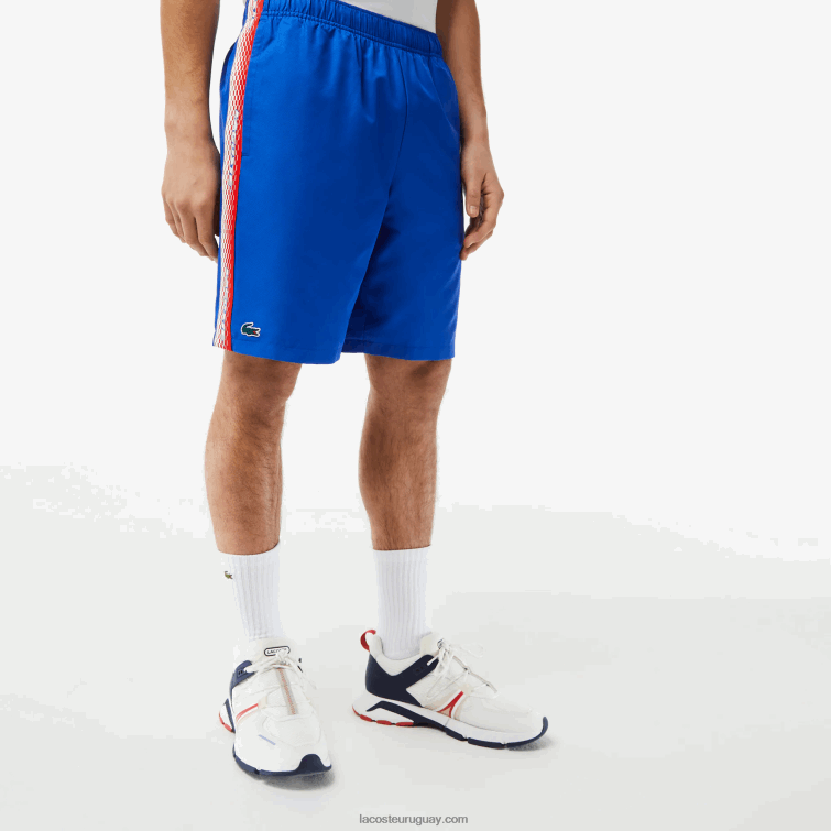 Lacoste hombres pantalones cortos de tenis de poliéster reciclado VVL0A18 kxb azul