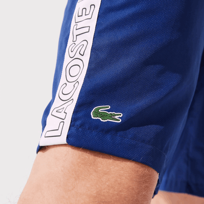 azul blanco emj VVL0A1505 hombres Lacoste shorts deportivos con franjas laterales