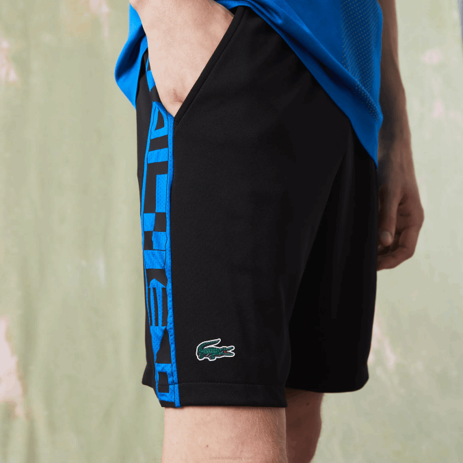 negro c31 VVL0A1535 hombres Lacoste shorts deportivos de tenis con estampado en contraste