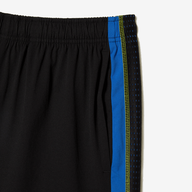 xis negro azul amarillo VVL0A425 hombres Lacoste pantalones cortos de tenis de poliéster reciclado