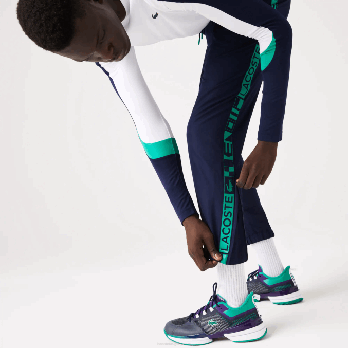 azul marino 166 VVL0A1089 hombres Lacoste pantalones deportivos de tenis con estampado lateral