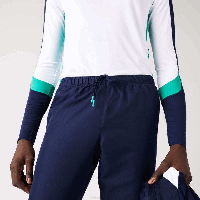 azul marino 166 VVL0A1089 hombres Lacoste pantalones deportivos de tenis con estampado lateral