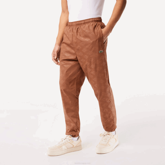 lfa marrón claro VVL0A317 hombres Lacoste pants con monograma estampado