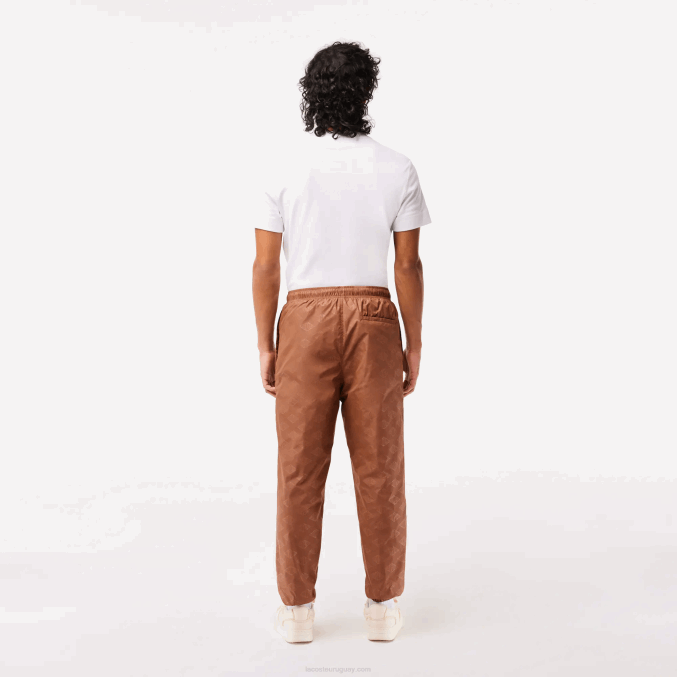 lfa marrón claro VVL0A317 hombres Lacoste pants con monograma estampado