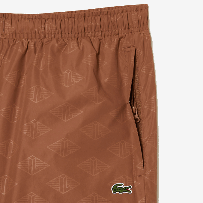 lfa marrón claro VVL0A317 hombres Lacoste pants con monograma estampado