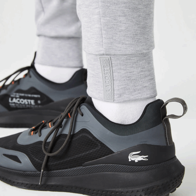lomo gris cca VVL0A1044 hombres Lacoste pantalones de chándal con estampado reflectante