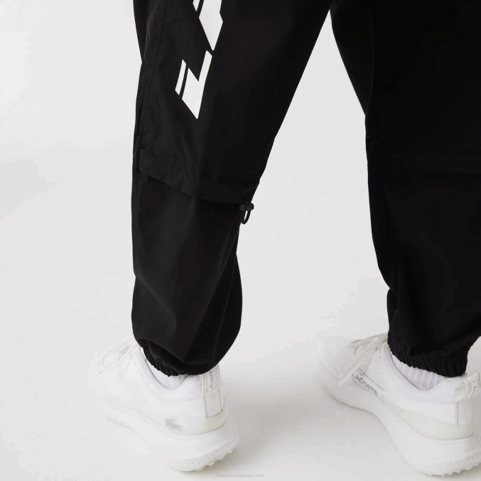 negro 031 VVL0A1003 hombres Lacoste pantalones de chándal oversize con logo en contraste