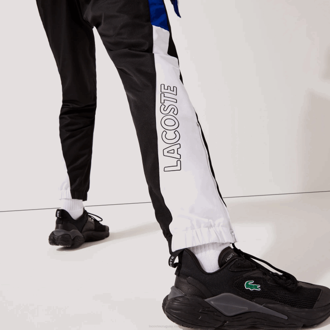 negro azul blanco negro aru VVL0A1129 hombres Lacoste pantalones de chándal deportivos con bandas colorblock