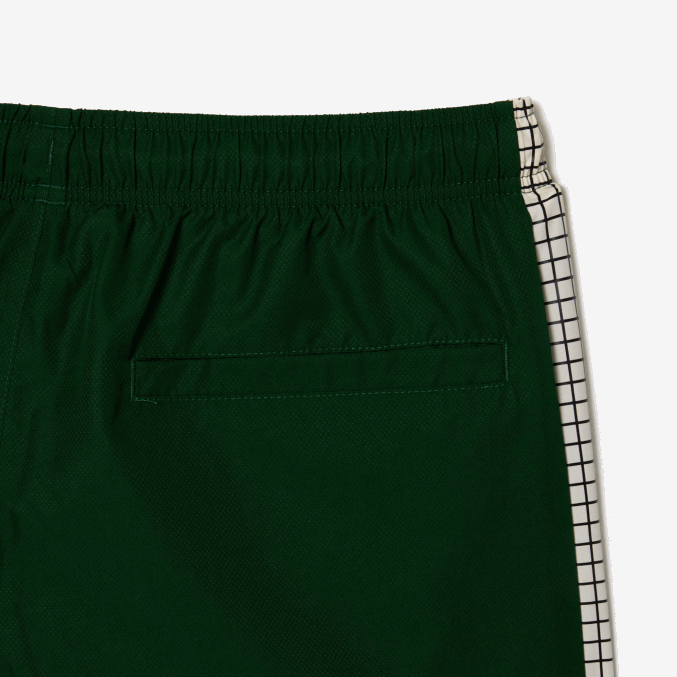 pqk verde blanco VVL0A372 hombres Lacoste pantalones de chándal con estampado de tenis