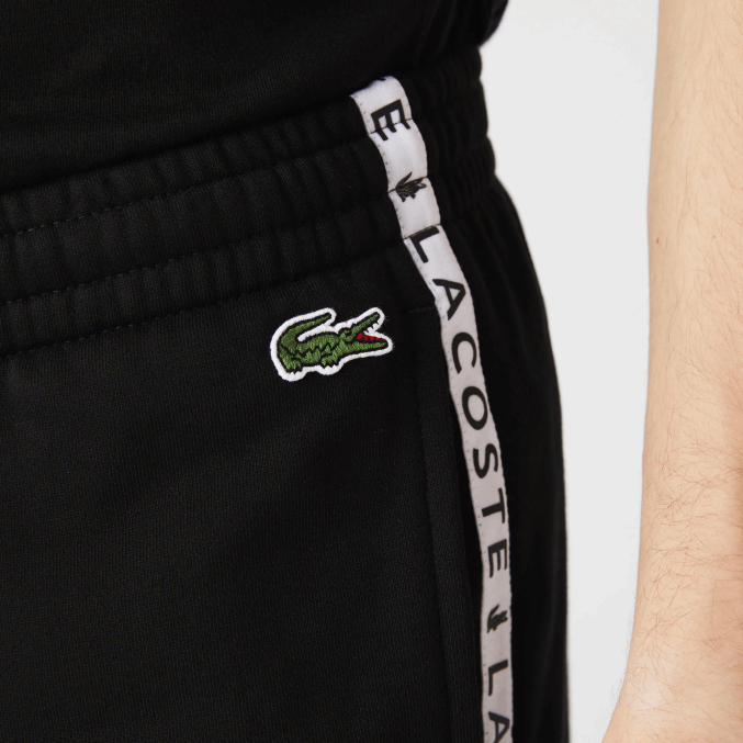 negro 8vm VVL0A1147 hombres Lacoste pantalones de chándal de vellón con bloques de colores a rayas de la firma