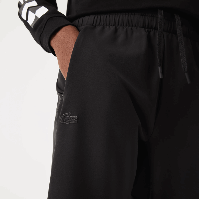 negro c31 VVL0A1091 hombres Lacoste pantalones deportivos con cremallera en la parte inferior