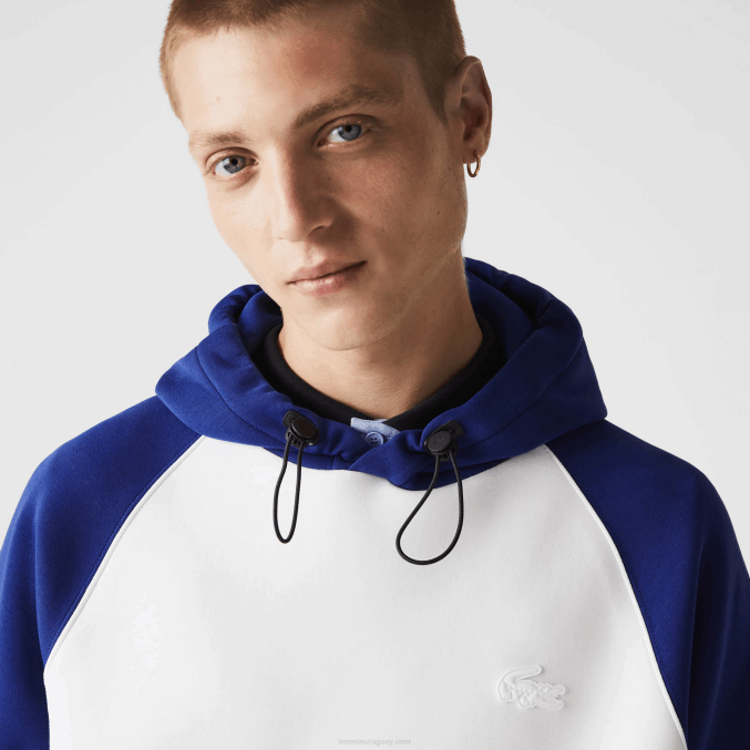 eme blanco azul VVL0A1190 hombres Lacoste sudadera bicolor con capucha y bolsillo con cremallera en contraste