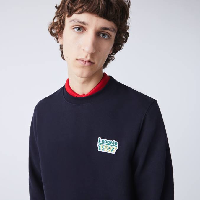 fondo azul marino VVL0A1162 hombres Lacoste sudadera con cuello redondo y logo vintage
