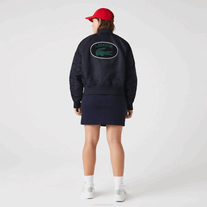fondo azul marino VVL0A2623 mujer Lacoste chamarra bomber acolchada de nailon