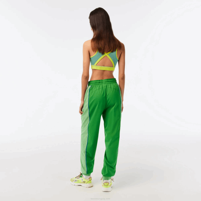 base de datos verde VVL0A2426 mujer Lacoste pants con efecto perforado