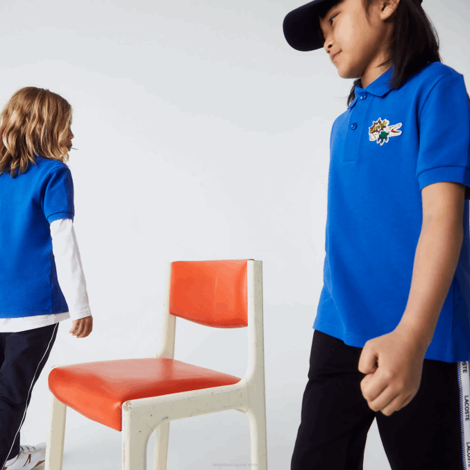 azul k1q VVL0A3145 niños Lacoste polo de piqué de algodón orgánico con insignia de cómic